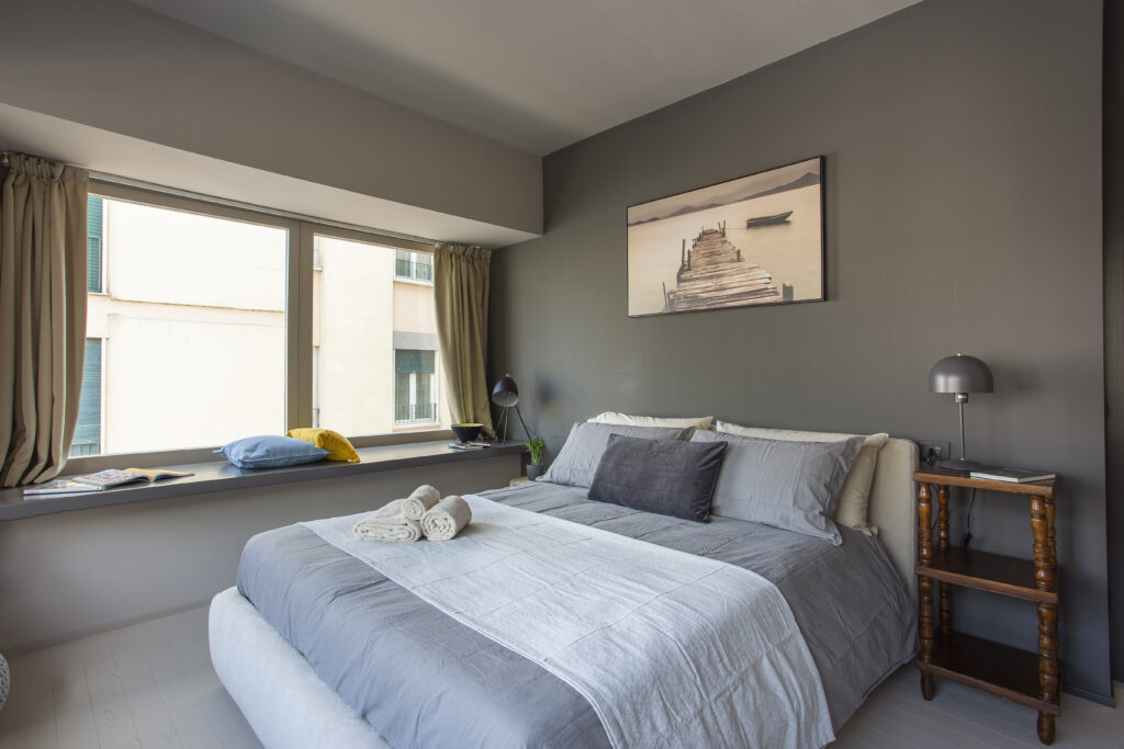 Grey Loft nel centro storico di Treviso camera da letto