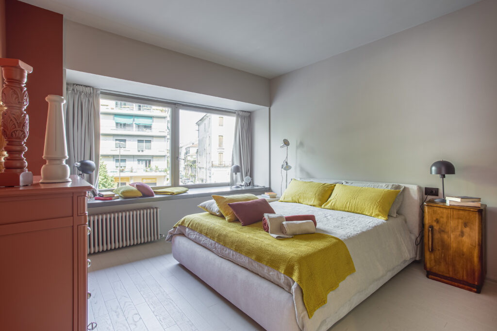 camera da letto Orange Loft nel centro storico di Treviso